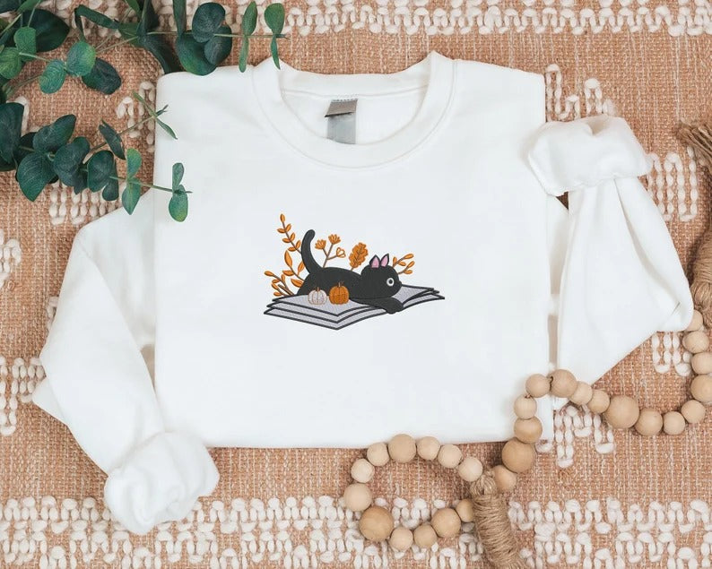 Halloween Black Cat Sweatshirt, Embroidered Vintage Fall Sweater, Cat Lying on Book Jumper, Fall Pumpkin Outfits, Halloween Gift for Hubby