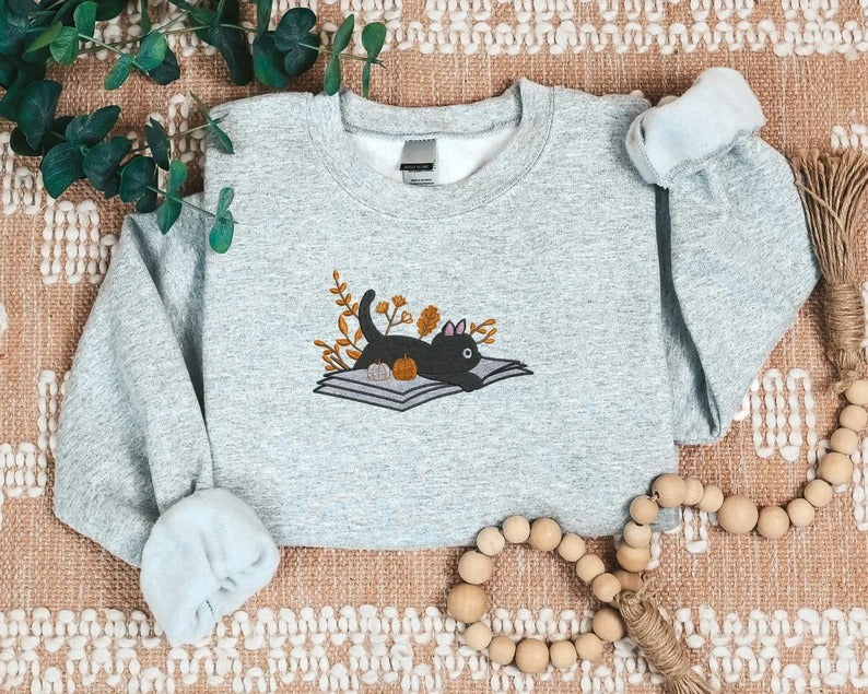 Halloween Black Cat Sweatshirt, Embroidered Vintage Fall Sweater, Cat Lying on Book Jumper, Fall Pumpkin Outfits, Halloween Gift for Hubby